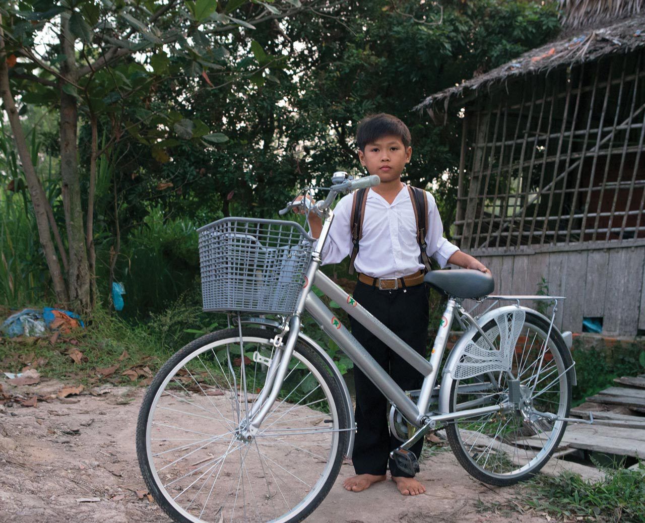 Stipendien - Jung mit Fahrrad